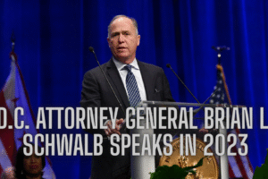 D.C. Attorney General Brian L. Schwalb speaks in 2023